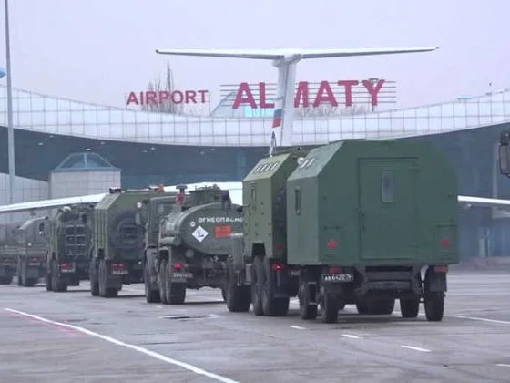Russian service members arrive at Almaty airport