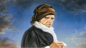 Man wearing turban brown robe white scarf blue background clouds 360x202